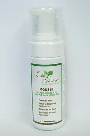 Lice Beware Mousse bottle, featuring a white pump dispenser, labeled as pesticide-free and designed to eliminate lice and nits, emphasizing its safety for repeated applications, surrounded by branding elements.